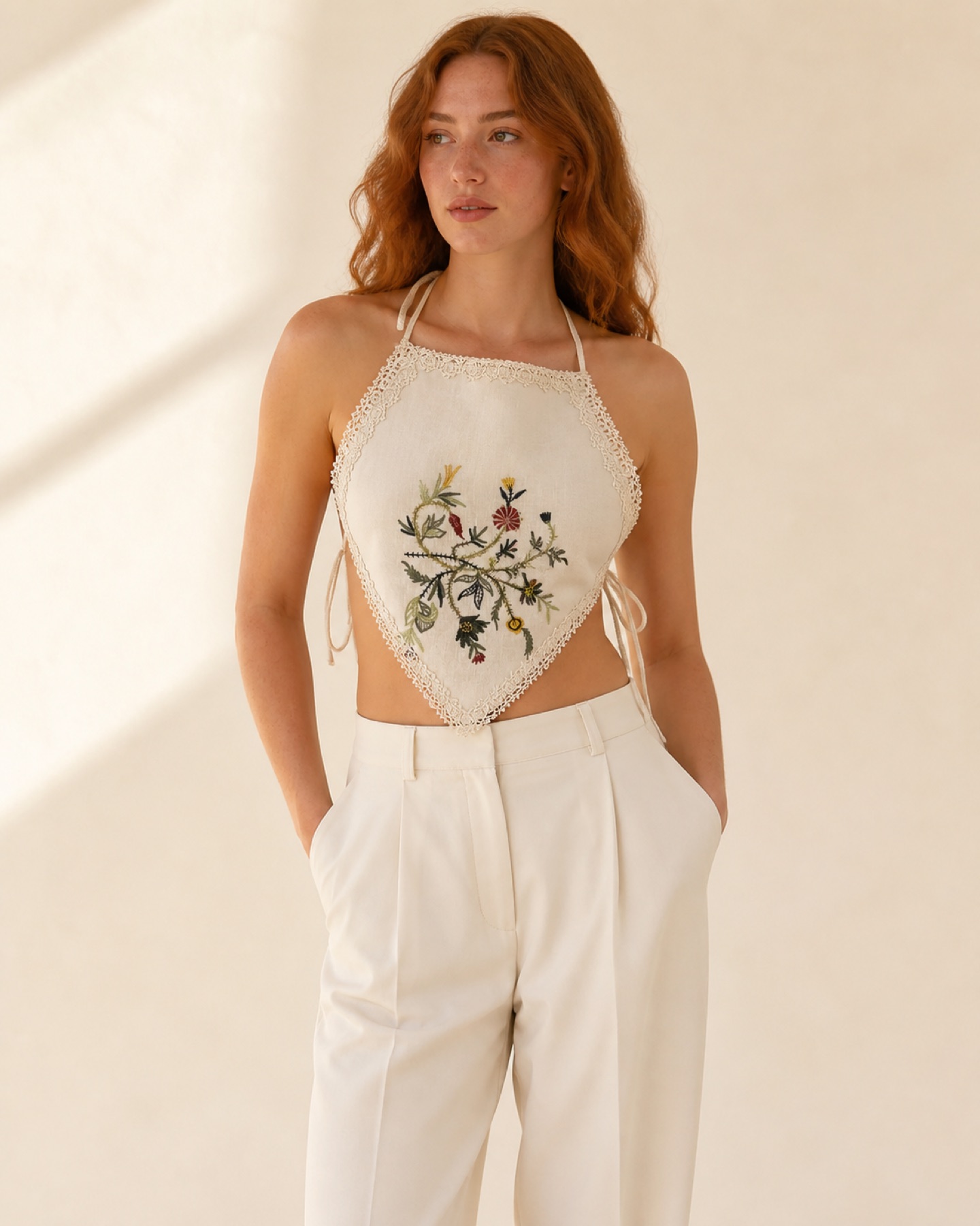 Model wearing Embroidered Crop Top