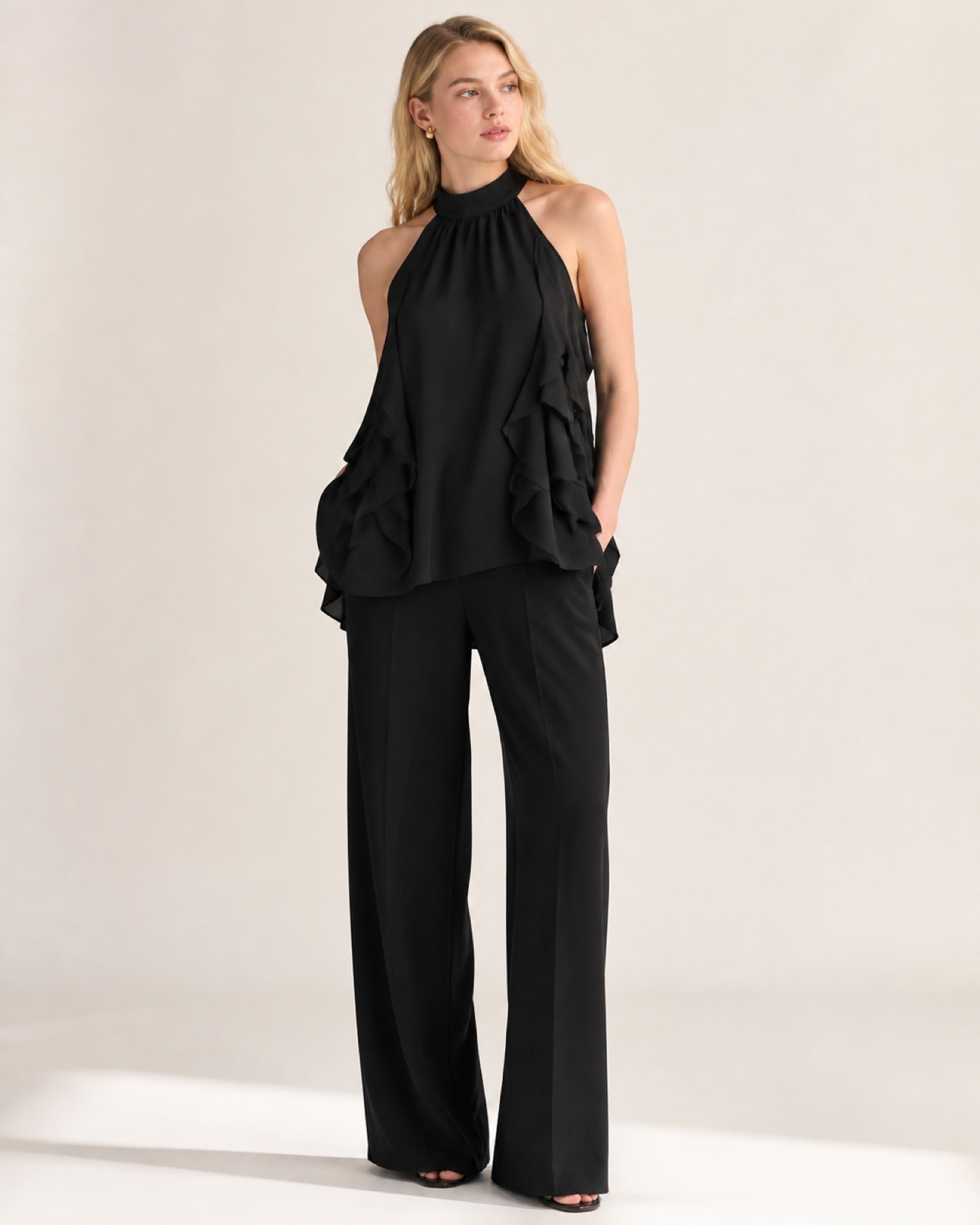 Model wearing Halter Ruffle Blouse