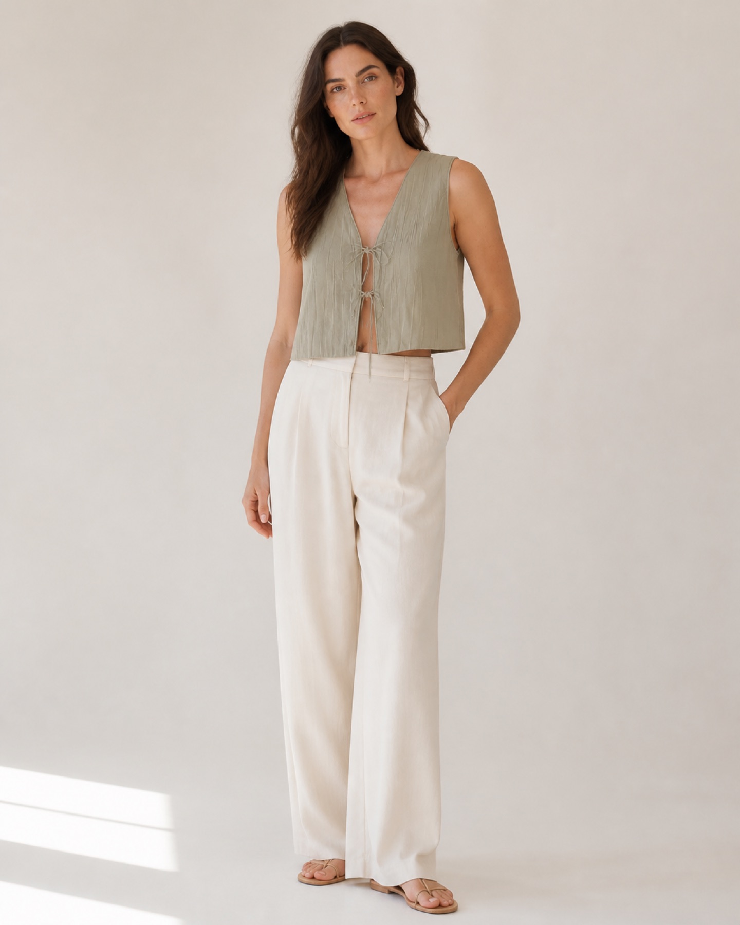 Model wearing Cropped Tie-Front Vest